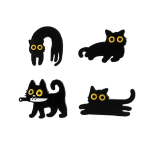 Set of four cute black cat enamel pins with yellow eyes and creative cartoon designs