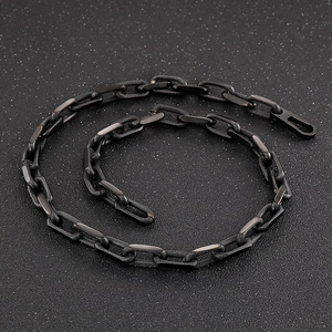 Close-up of black stainless steel 10mm oval link chain necklace with lobster clasp closure