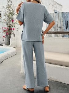 Detail showing the light blue waffle texture of the back of a women's two-piece lounge set