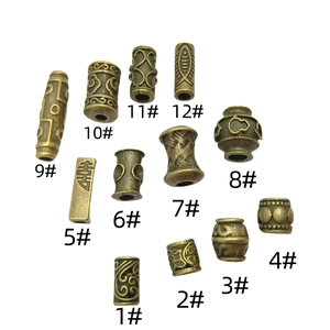 Set of 12 vintage bronze spacer beads with diverse patterns for DIY jewelry making