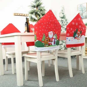 Christmas chair covers featuring Santa, snowman, and reindeer for holiday dining decor