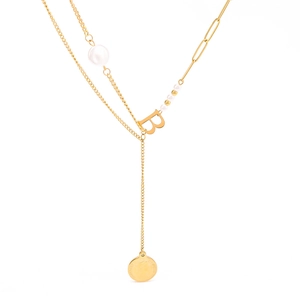 Layered gold 18k necklace featuring pearls and a letter B pendant on a white background