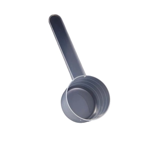 Gray plastic measuring spoon with precise scale markings and long handle on white background