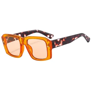 Retro oversized square sunglasses with orange transparent frame and tortoise shell temples