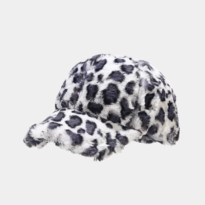 Detail of warm plush baseball cap featuring black and white faux fur leopard print texture