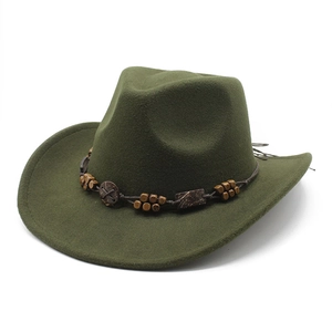 Detail of dark green wool western hat with ethnic wooden bead and woven band