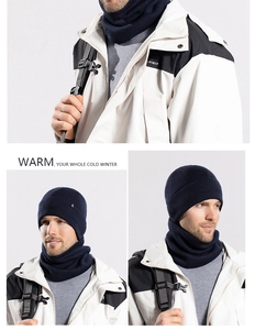 Detail of navy knit beanie and neck warmer set with warm fleece lining for winter wear