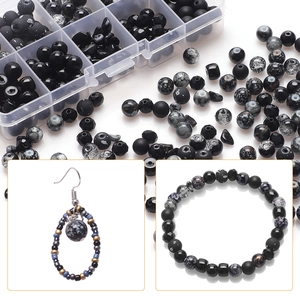 DIY jewelry kit with black and grey glass beads in a storage box for bracelet making