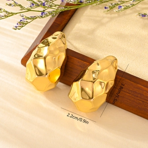 Golden titanium steel earrings with hammered texture and geometric hollow design