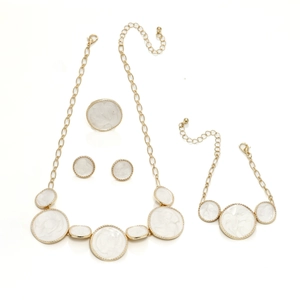 Gold jewelry set featuring white enamel round necklace, bracelet, earrings and ring