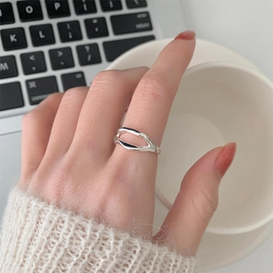 Irregular oval cut-out 925 sterling silver ring with a minimalist polished finish