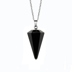 Macro detail of hexagonal black obsidian crystal pendant with polished silver chain