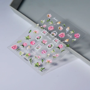 Detail of FEB-657 embossed pink flower nail stickers with birds and retro frame patterns