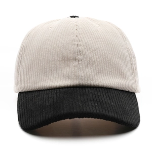 Classic corduroy baseball cap in beige and black color block style for outdoor sun protection