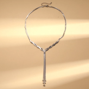Detailed view of silver Y-shaped layered chain necklace with hanging bead tassels