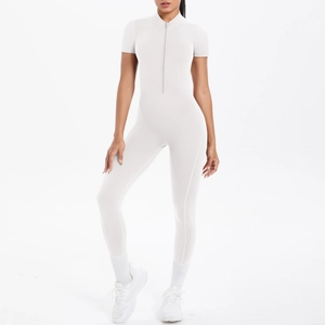 Close-up of white short-sleeve athletic jumpsuit with invisible zipper and high collar