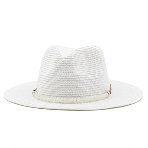 Close-up of white woven Panama hat with brown cord band and white stone bead accents