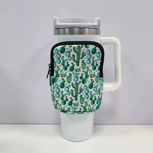 Detail of neoprene 40oz tumbler sleeve with cactus print and functional zipper pocket