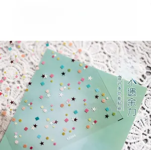 Macro shot of KX044 matte nail art stickers with colorful stars and geometric shapes