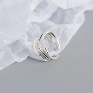 Macro shot of silver S925 double-layer irregular ring with textured surface details