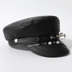 Punk style black faux leather navy hat with silver rivets and metal studs on white background