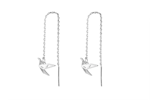 Macro shot of silver origami paper crane threader earrings with inlaid cubic zirconia