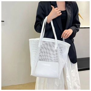 Detail of white mesh tote bag with breathable PVC texture and large capacity style