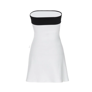 Detail view of white strapless mini dress with elegant black trim and A-line silhouette