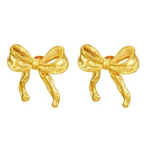Elegant 18k gold plated titanium steel bow earrings set on a clean white background
