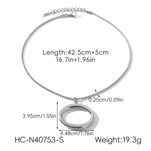 Detail of silver hollow oval pendant on twisted rope chain with lobster clasp and extension