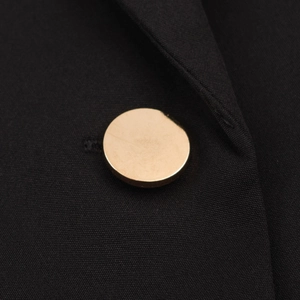 Women's long oversized street coat in black with gold metallic button detail
