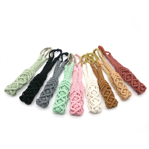 Handmade bohemian cotton rope hairbands in various colors arranged in a neat fan shape