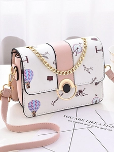 Pink and white stylish crossbody bag featuring travel prints and golden chain strap