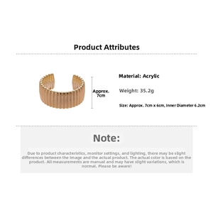 Detailed specs of the gold acrylic cuff bracelet with vertical prism texture