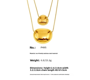 Macro detail of polished 18k gold plated organic bean pendant necklace dimensions