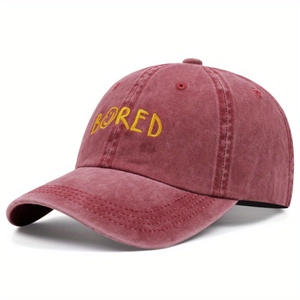 Maroon washed cotton baseball cap with yellow BORED embroidery and smiley face icon
