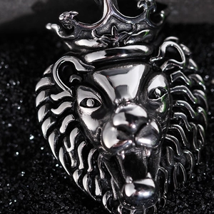 Gothic silver lion head with crown pendant in stainless steel for men on dark background