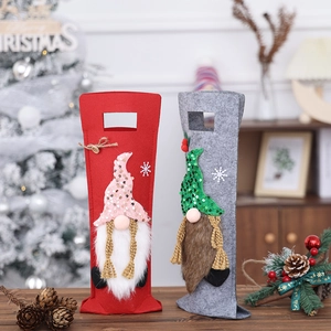 Christmas gnome wine bottle covers with sequins and faux fur for festive table decor