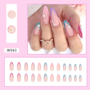 Colorful floral almond press-on nails with pink gradient and French tip daisy patterns