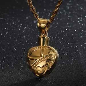 Vintage gold stainless steel heart pendant necklace with embossed dotted patterns