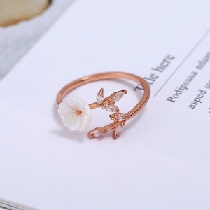 Adjustable rose gold flower ring with shell petals and sparkling marquise zircon leaves