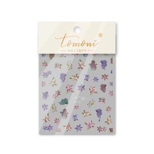Macro view of MS-36 nail art stickers featuring purple and pink floral patterns with packaging