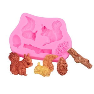 Squirrel and pine cone silicone fondant mold for forest themed cake decorating