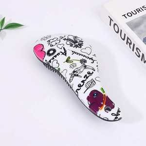 Portable air cushion hairbrush with colorful graffiti pattern for detangling and massage