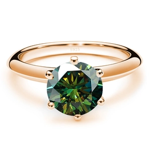 Detail shot of a six-prong green moissanite ring showing the S925 silver stamp