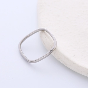 Polished square titanium steel ring with a single small diamond accent for women