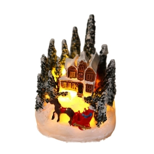 Light-up Christmas resin house with snow-covered trees and horse carriage decoration