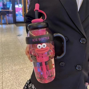 Detail view of pink high-capacity water bottle with handle, lid, and straw