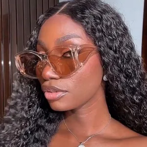 Chic oversized Y2K cat-eye sunglasses with translucent light brown frames and brown lenses