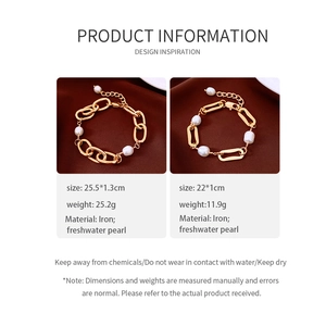 Detail of 18k gold plated chain bracelets with freshwater pearls on silk background